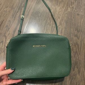 Michael Kors forest green purse. Lightly used - Great for the holidays!